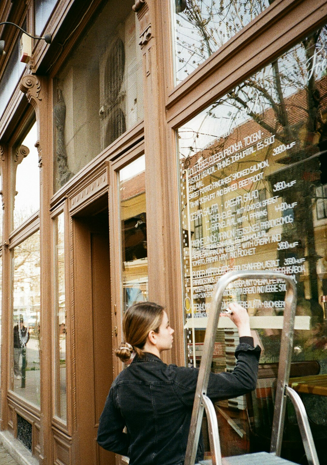 woman cleaning window