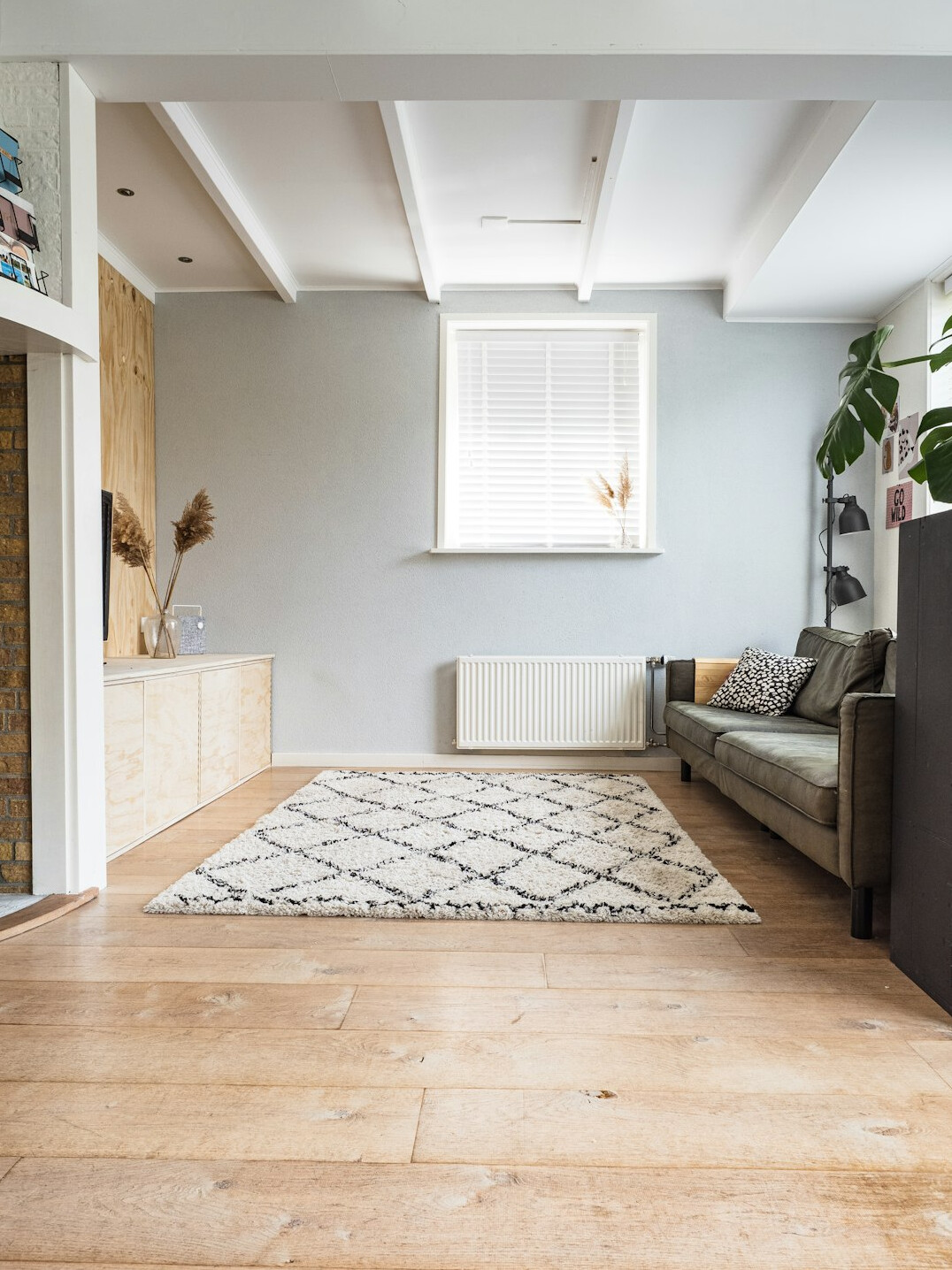 tidy living room with sofa